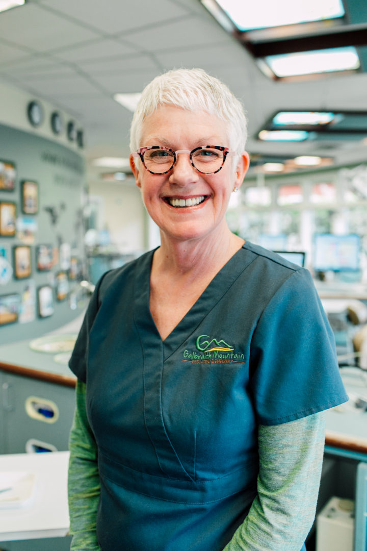 pediatric dental assistant wearing anne et valentin glasses photography by Katheryn Moran Photography